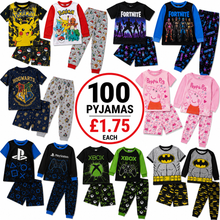Load image into Gallery viewer, A collage showing multiple children's long-sleeve and matching shorts pajama sets arranged on a white background, with a central red and black circular badge reading '100 PYJAMAS £1.75 EACH.