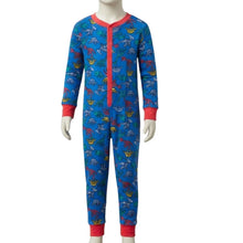 Load image into Gallery viewer, A long-sleeve children's one-piece pajama top with an allover dinosaur print on a bright blue background, featuring red trim along the zipper, cuffs, and collar, displayed on a mannequin against a white background.