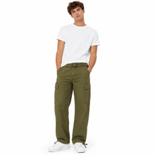 Load image into Gallery viewer, A male model wearing olive green cargo pants, a white t-shirt, and white sneakers, standing against a solid white background.